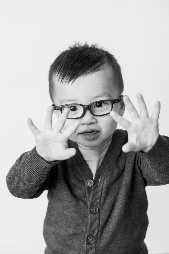 Classic black & white kids portrait photography - little boy showing hands by Paper Bunny Studios Edmonton 