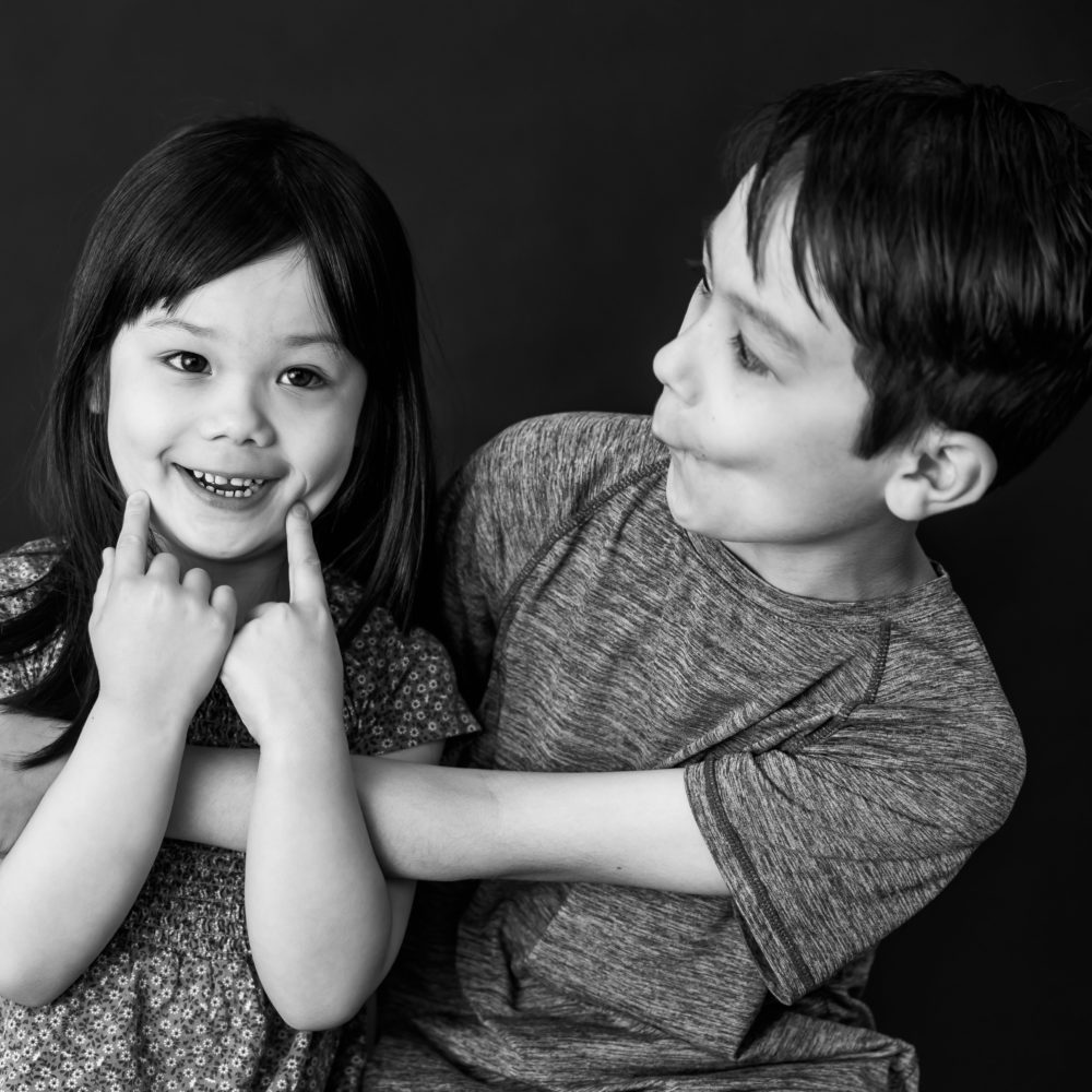 Sibling photo - black & white kids photography by Paper Bunny Studios