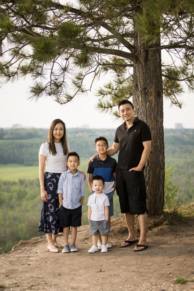 Artistic documentary family photography posed family portrait by tree by Paper Bunny Studios Edmonton