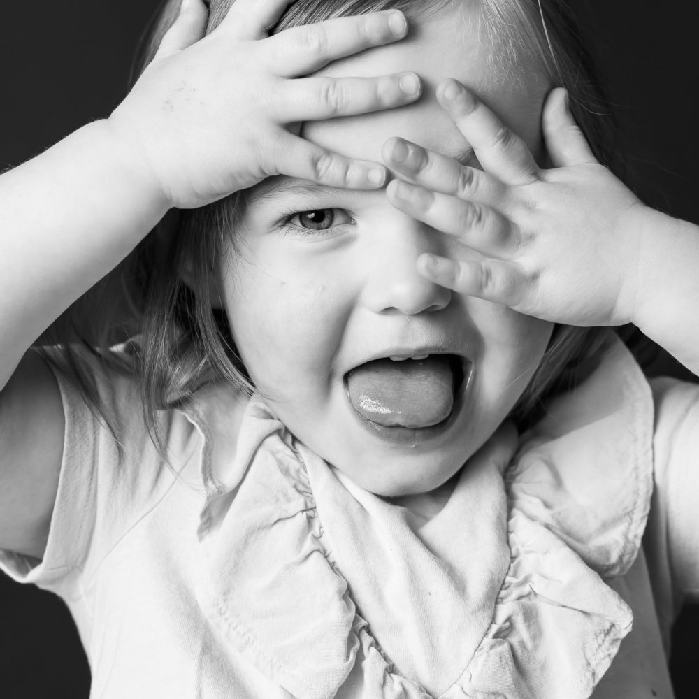 Black & White kids portrait photo by Paper Bunny Studios - little girl hiding behind hands