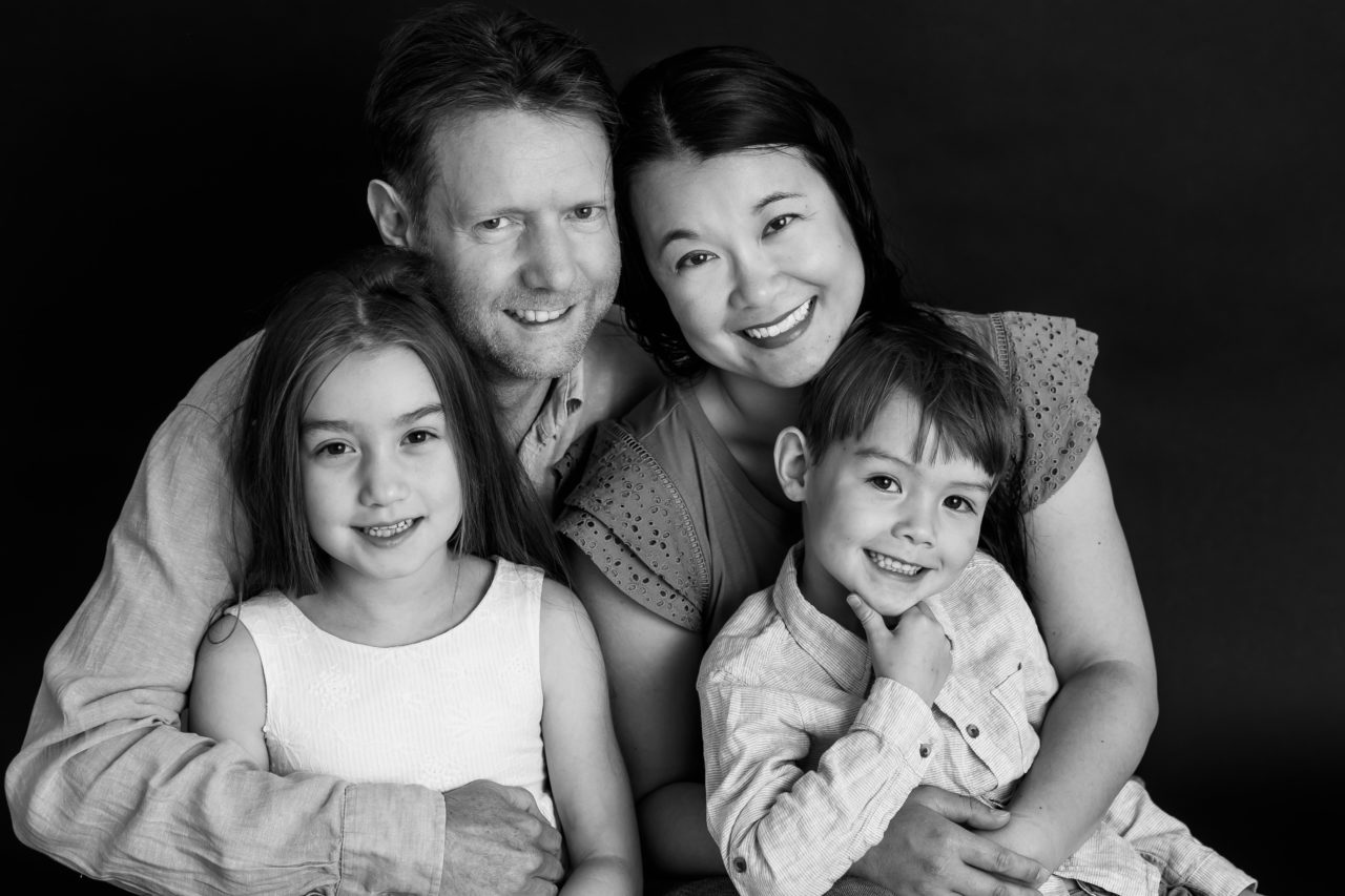 Young Family black & white studio portrait by Paper Bunny Studios