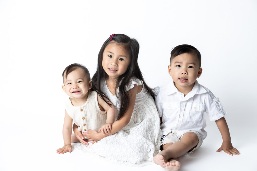First Birthday Cake Smash photography - baby & older siblings by Paper Bunny Studios Edmonton