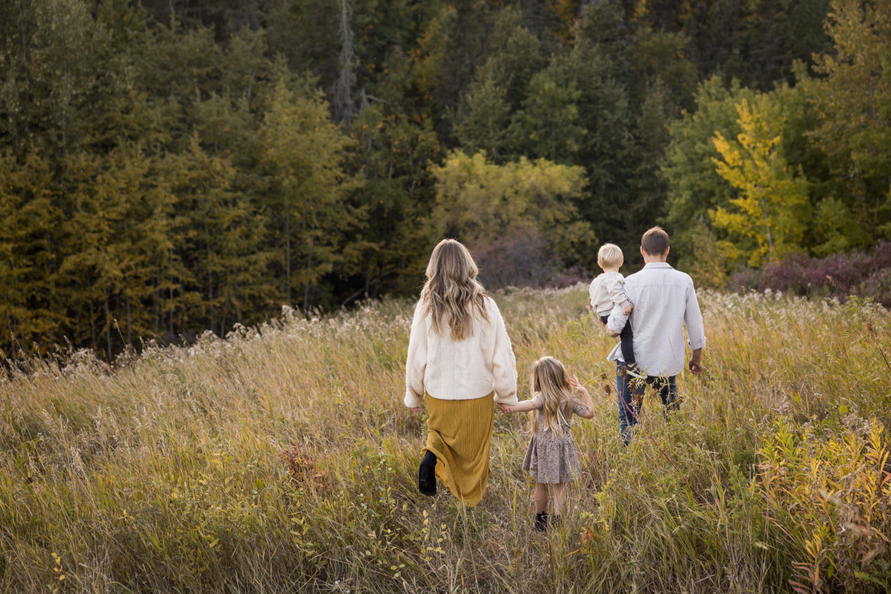 Edmonton Fall family photos - family walking by Paper Bunny Studios