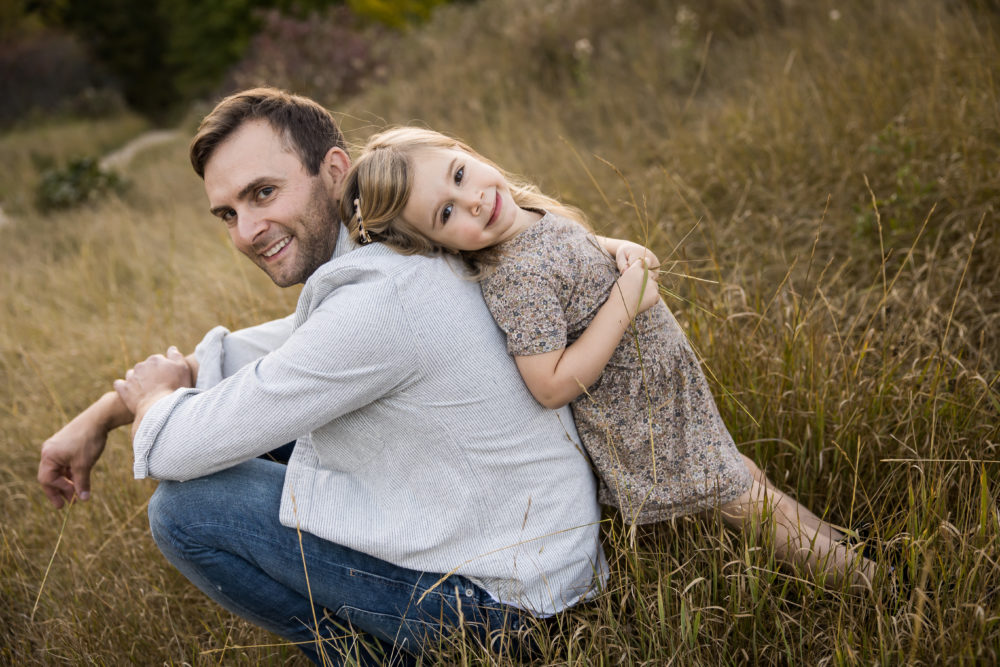 Edmonton Fall family photos - sweet, candid father/daughter moment by Paper Bunny Studios