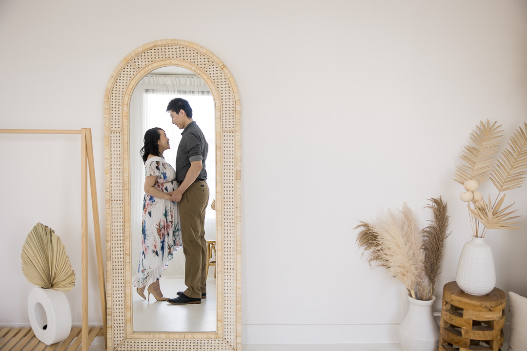Artistic maternity photos - mirror reflection of mom & dad to be by Paper Bunny Studios Edmonton family photographer