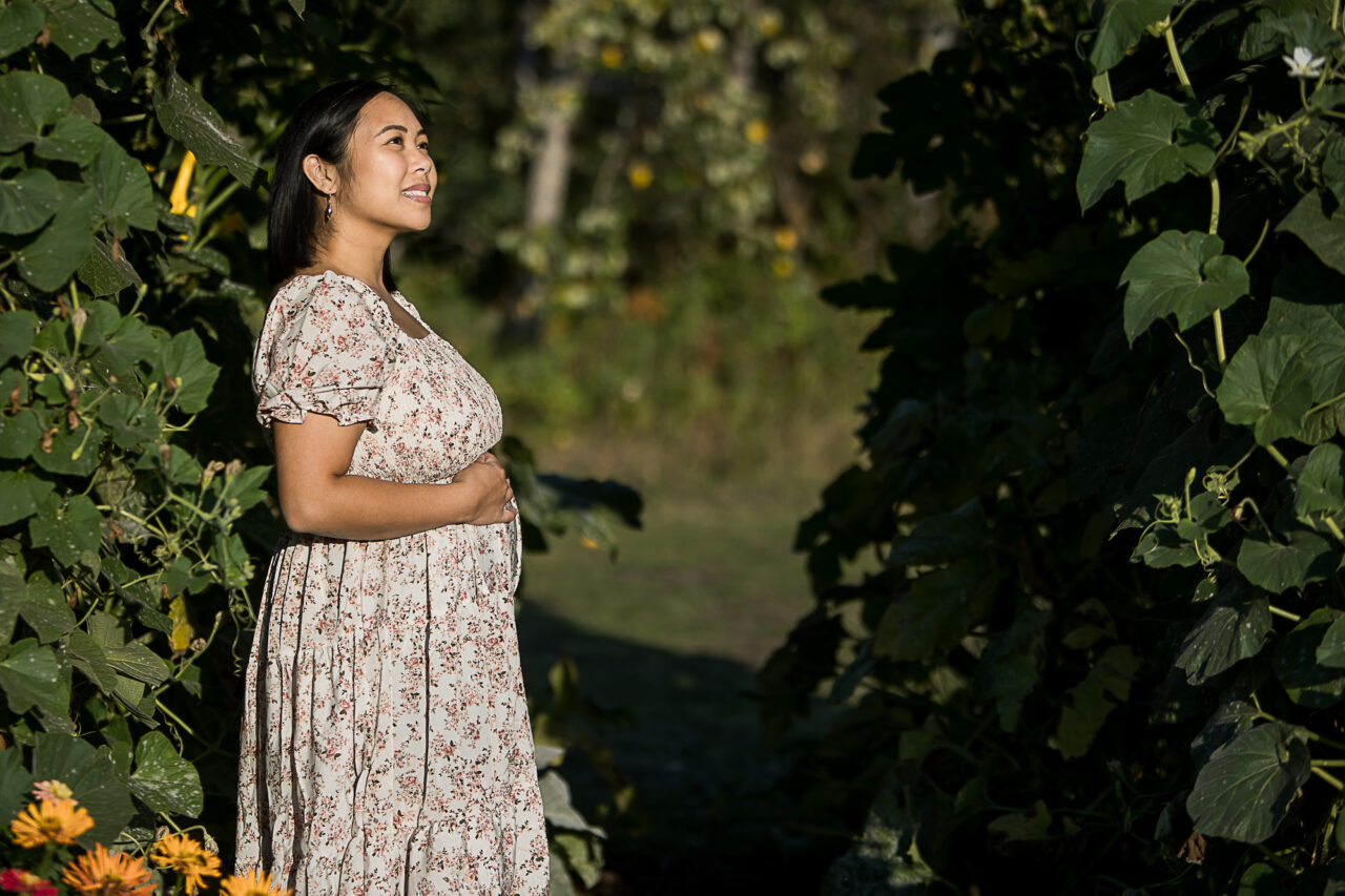 Sunlit photo of mom and bump by Edmonton family photographer Paper Bunny Studios