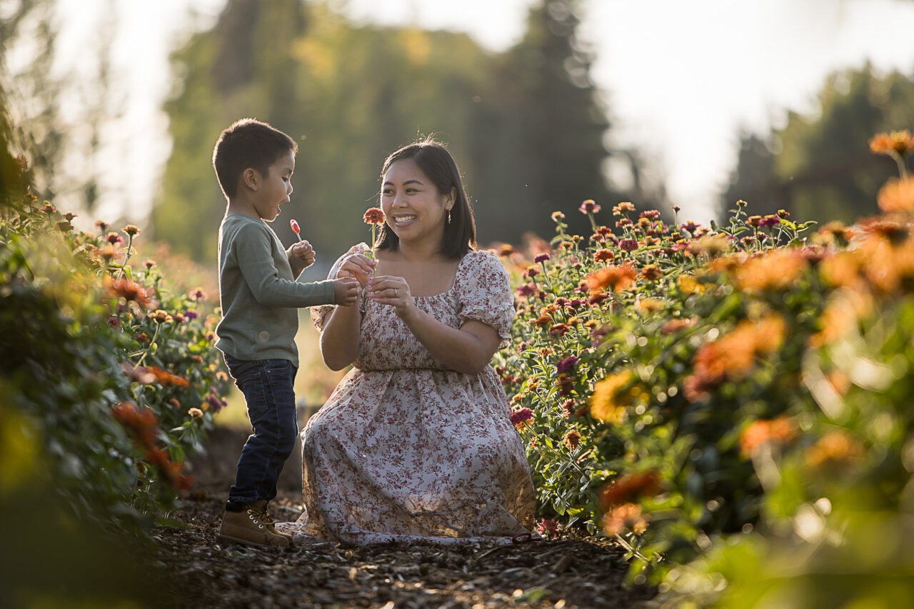 Documentary fall family photos in pick your own flower farm of mom & son by Edmonton family photographer Paper Bunny Studios