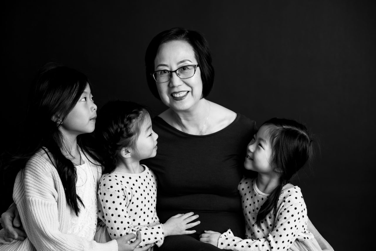 Black & White multi-generational family photography - Grandma with kids